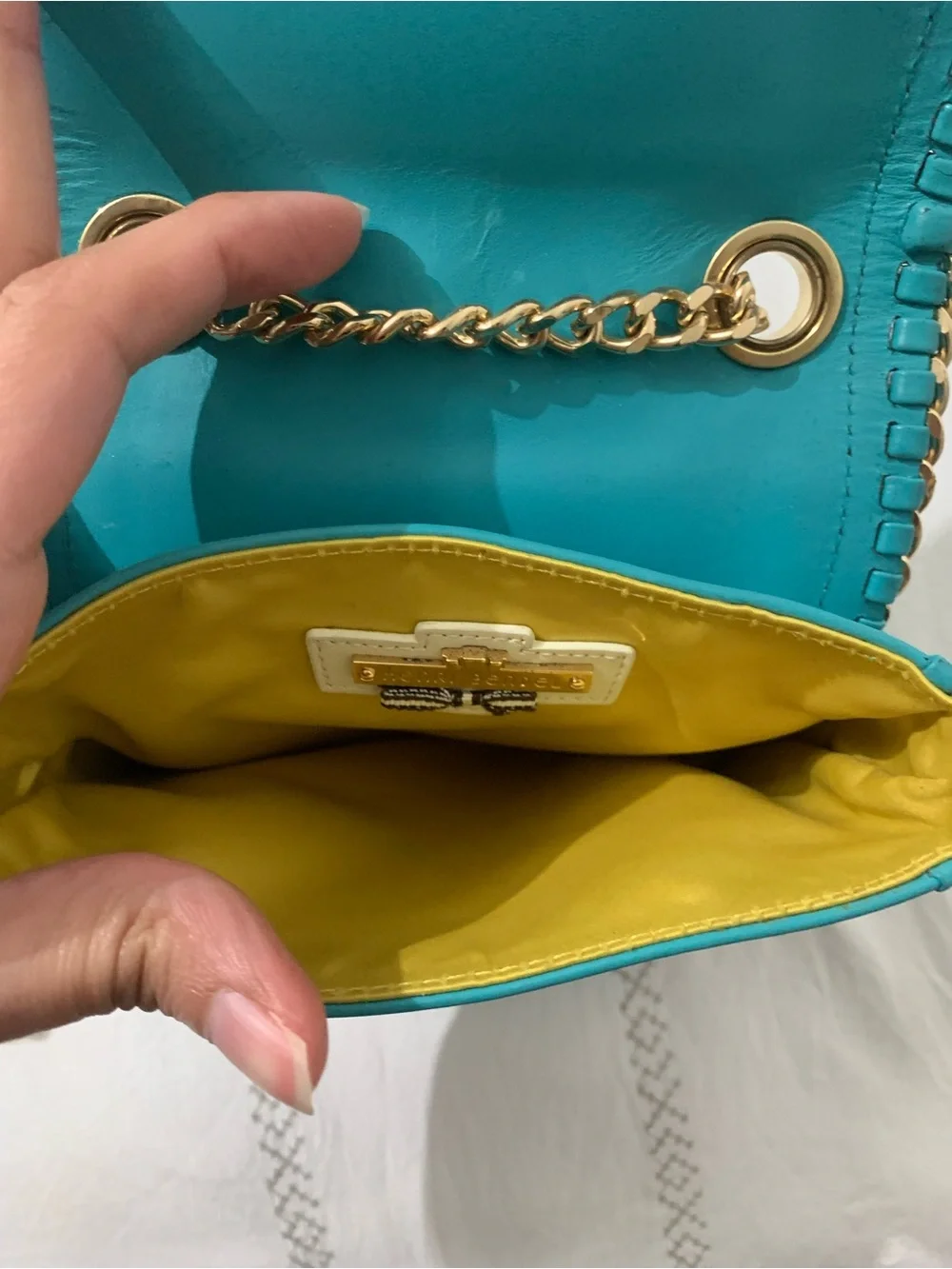 henri bendel Turquoise Perforated Crossbody with Gold Chain Trim